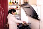 Feb. 14, 2019 -- Photo shows a villager from Takar Town of Chushur cooking at the kitchen, Lhasa, capital of southwest China`s Tibet Autonomous Region. Her family has been relocated from impoverished areas in 2018. [China Tibet News/Yuan Haixia]