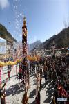 Feb. 15, 2019 -- People of Tibetan ethnic group perform during the Shangjiu Festival at the foot of Jiajin Mountain in the Tibetan Township of Qiaoqi in Ya`an City, southwest China`s Sichuan Province, Feb. 13, 2019. The Shangjiu Festival, a traditional festival of the Tibetan people, is celebrated on the ninth day of the first lunar month to pray for a good harvest. (Xinhua/Jiang Hongjing) 