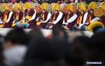 Feb. 19, 2019 -- A lama band accompanies the exorcism dance performed by masked lamas at a square of the Labrang Monastery in Xiahe County, northwest China`s Gansu Province, Feb. 18, 2019. The Labrang Monastery held the annual event of exorcism dance to pray for good luck in the new year. Built in 1709, Labrang Monastery is one of the six great monasteries of the Gelug Sect of Tibetan Buddhism. (Xinhua/Chen Bin)