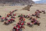 Mar. 18, 2019 -- Aerial photo taken on March 16, 2019 shows people attending a ceremony marking the start of spring plowing in Tanggar Township of Lhasa, southwest China`s Tibet Autonomous Region. (Xinhua/Sun Fei)