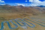 Mar. 28, 2019 -- Aerial photo taken on May 18, 2017 shows a zigzag asphalt road leading to Mount Qomolangma in southwest China`s Tibet Autonomous Region. Infrastructure has been improved in Tibet, as a comprehensive transportation network composed of highways, railways and air routes has been formed. (Xinhua/Purbu Zhaxi)