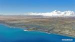 April 28, 2019 -- Aerial photo taken on April 26, 2019 shows the scenery of Baiku Co (Baiku Lake) near Mount Shishapangma, southwest China`s Tibet Autonomous Region. Baiku Co, with an elevation of 4,590 meters, is located on the border of Nyalam County and Jilong County. (Xinhua/Jigme Dorje)