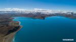 May 28, 2019 -- Aerial photo taken on May 24, 2019 shows the scenery of the Yamzbog Yumco Lake in Nagarze County of Shannan, southwest China`s Tibet Autonomous Region. The Yamzbog Yumco Lake is regarded as one of the three largest sacred lakes in Tibet. (Xinhua/Purbu Zhaxi)