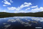 May 28, 2019 -- Photo taken on May 21, 2019 shows the scenery of the Nianbaoyuze Mountain Scenic Resort in Jiuzhi County of the Tibetan Autonomous Prefecture of Golog in northwest China`s Qinghai Province. (Xinhua/Zhang Hongxiang)