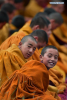 July 16,2019--Monks attend a Thangka display ritual at the Tashilhunpo Monastery in Xigaze, southwest China`s Tibet Autonomous Region, July 15, 2019. Thangka are Tibetan Buddhist artworks painted on cotton or silk. The religious paintings can be traced back to the 10th century and typically depict Buddhist deities. (Xinhua/Chogo)