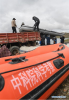 July 24, 2019 -- Members of a Chinese scientific expedition team prepare a rubber dinghy for survey in Nanggarze County of Shannan, southwest China`s Tibet Autonomous Region, July 22, 2019. Chinese scientists are working on a survey to measure the depth of a major lake in southwest China`s Tibet Autonomous Region, sources with the Chinese Academy of Sciences (CAS) said Tuesday. Lake Yamzhog Yumco with an area of about 590 square km is located in Nanggarze County in the city of Shannan. Yamzhog Yumco along with Lake Namtso and Lake Manasarovar are regarded as the three holy lakes of Tibet. (Xinhua/Jigme Dorje)