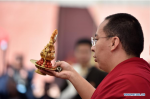 July 26, 2019 -- The 11th Panchen Lama Bainqen Erdini Qoigyijabu holds a Buddhist activity at Toling Monastery in Ali, southwest China`s Tibet Autonomous Region, July 24, 2019. (Xinhua/Chogo)