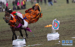 Aug.1, 2019 -- A herdsman performs horseback archery during a horse racing festival. The festival kicked off on Tuesday in Bayi Racecourse, Litang County of Ganzi Tibetan Autonomous Prefecture in southwest China’s Sichuan province. Nearly 1,000 herdsmen participated in horse riding and performed stunning stunts, such as picking up hadas while riding a horse, horseback archery, bringing great enjoyment to local people and visitors. (Xinhua/Jiang Hongjing)(Translate by Gao Jingna)