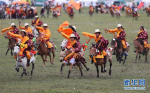 Aug.1, 2019 -- Herdsmen gallop across the grassland during a horse racing festival. The festival kicked off on Tuesday in Bayi Racecourse, Litang County of Ganzi Tibetan Autonomous Prefecture in southwest China’s Sichuan province. Nearly 1,000 herdsmen participated in horse riding and performed stunning stunts, such as picking up hadas while riding a horse, horseback archery, bringing great enjoyment to local people and visitors. (Xinhua/Jiang Hongjing)(Translate by Gao Jingna)