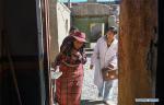 Aug.6, 2019 -- Village doctor Zhoima (R) pays a home visit in Wuqang Village of Dongmar Township in Rutog County, Ngari Prefecture, southwest China`s Tibet Autonomous Region, Aug. 3, 2019. Born in 1979, Zhoima has been a village doctor in Wuqang for more than 20 years. It is estimated that each year she provides more than 600 diagnoses and treatment to villagers, regardless of the weather and journey. (Xinhua/Jigme Dorje)