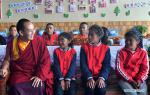 Aug.6, 2019 -- The 11th Panchen Lama (1st L, front) spends time with children of an orphanage in Ali Prefecture of southwest China`s Tibet Autonomous Region, July 28, 2019. Bainqen Erdini Qoigyijabu, the 11th Panchen Lama, who is also a member of the Standing Committee of the Chinese People`s Political Consultative Conference (CPPCC) National Committee and vice president of the Buddhist Association of China, recently went on a research tour on the society in Ali Prefecture. (Xinhua/Chogo)