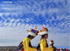 Aug.13, 2019 -- People wearing hats are seen during a horse racing festival in Nagqu City, southwest China`s Tibet Autonomous Region, Aug. 10, 2019. People in Amdo County of Nagqu City have a tradition of wearing hats, which are now mostly made from lamb skins and artificial leather.The hat usually has an antenna-like stripe of fabric at the top. (Xinhua/Chogo)