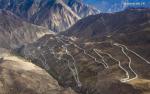 Nov.15,2019 -- Aerial photo taken on Oct. 23, 2019 shows part of Nujiang River zigzag road on the Sichuan-Tibet highway in Baxoi County, southwest China`s Tibet Autonomous Region. The Sichuan-Tibet highway, which was put into operation on Dec. 25, 1954 and has a length of over 2,000 kilometers. Over the past 65 years, the central and local governments have invested heavily to lift the highway`s traffic capacity and safety. Besides more tunnels and bridges, almost all sections of the highway have been widened and asphalted. (Xinhua/Jiang Hongjing)
