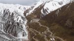 Nov.15,2019 -- Photo taken on Oct. 30, 2019 shows part of the No. 317 national highway on Xiela mountain on the Sichuan-Tibet highway. The Sichuan-Tibet highway, which was put into operation on Dec. 25, 1954 and has a length of over 2,000 kilometers. Over the past 65 years, the central and local governments have invested heavily to lift the highway`s traffic capacity and safety. Besides more tunnels and bridges, almost all sections of the highway have been widened and asphalted. (Xinhua/Jiang Hongjing)