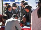 Nov.19, 2019 -- Job seekers are seen at an employer`s booth during a job fair in Lhasa, capital of southwest China`s Tibet Autonomous Region, Nov. 18, 2019. A job fair held on Monday attracted about 205 employers providing over 3,500 job posts. (Xinhua/Jigme Dorje)