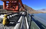 Dec.4,2019 -- Workers of China Railway 11 Bureau Group Co., Ltd. lay steel rail for a bridge crossing the Yarlung Zangbo River of Lhasa-Nyingchi railway in Sangri County of Shannan, southwest China`s Tibet Autonomous Region, Dec. 1, 2019. (Xinhua/Chogo)