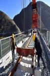 Dec.4,2019 -- Workers of China Railway 11 Bureau Group Co., Ltd. lay steel rail for a bridge crossing the Yarlung Zangbo River of Lhasa-Nyingchi railway in Sangri County of Shannan, southwest China`s Tibet Autonomous Region, Dec. 1, 2019. (Xinhua/Chogo)