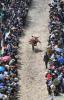 Dec.24,2019 -- A man performs during a traditional horse racing in Lhunzhub County, southwest China`s Tibet Autonomous Region, July 30, 2019. From scientific expedition at the Lake Yamzbog Yumco to wildlife conservation patrol mission in Shuanghu County at an average altitude of more than 5,000 meters, from a traditional festive horse racing to annual facelift of the Potala Palace, the photographers of Xinhua captured local people`s daily lives and achievements on social development in Tibet in 2019, the year marking the 60th anniversary of the campaign of democratic reform in Tibet. A selection of photos from the `InTibet` column shows beauty of nature on the plateau and stories of local people improving their lives with hard work. (Xinhua/Purbu Zhaxi)