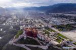 Dec.24,2019 -- Aerial photo taken on Aug. 10, 2019 shows the old town of Lhasa, capital city of southwest China`s Tibet Autonomous Region. From scientific expedition at the Lake Yamzbog Yumco to wildlife conservation patrol mission in Shuanghu County at an average altitude of more than 5,000 meters, from a traditional festive horse racing to annual facelift of the Potala Palace, the photographers of Xinhua captured local people`s daily lives and achievements on social development in Tibet in 2019, the year marking the 60th anniversary of the campaign of democratic reform in Tibet. A selection of photos from the `InTibet` column shows beauty of nature on the plateau and stories of local people improving their lives with hard work. (Xinhua/Purbu Zhaxi)