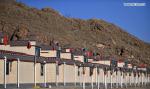 Dec.25,2019 -- Photo taken on Dec. 23, 2019 in the south bank of the Yarlung Zangbo River, shows new houses built for herders migrating from Shuanghu County, Nagchu City, southwest China`s Tibet Autonomous Region. A total of 2,900 residents from three villages of Shuanghu County, have recently left their hometown with an average altitude of 5,000 meters above sea level and travelled nearly 1,000 kilometers to resettle in Konggar County, which, at a relatively low altitude, is located to the south bank of the Yarlung Zangbo River in southern Tibet. (Xinhua/Chogo)