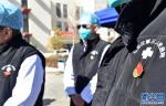 Feb.4,2020 -- Photo shows during the fight against novel coronavirus, Communist Party members from major hospitals in Lhasa City, the capital of southwest China`s Tibet Autonomous Region stand in the front. [Xinhua/Chogo]