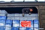 Feb.17,2020 -- A staff member loads supplies in Lhasa, capital of southwest China`s Tibet Autonomous Region, Feb. 14, 2020. Supplies comprised of 50 tons of yak meat and 169,000 boxes of mineral water were sent to Huanggang and Shiyan of central China`s Hubei Province from Lhasa on Friday. (Xinhua/Jigme Dorje)