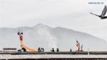 Feb.27,2020 -- People replace prayer flags on the rooftop to wish for bumper grain harvest in Lhasa, southwest China`s Tibet Autonomous Region, Feb. 26, 2020. The Tibetan New Year, a traditional festival of the Tibetan ethnic minority, falls on Monday this year. (Xinhua/Jigme Dorje)