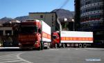 March 2,2020 -- Trucks loaded with donations of life necessities to Hubei Province depart from Changdu, southwest China`s Tibet Autonomous Region, Feb. 28, 2020. Containing 2,000 tons of drinking water and 60 tons of pork, the second batch of donations from Tibet were sent to Hubei on Friday to aid the novel coronavirus fight there. (Photo by Peng Hong/Xinhua)