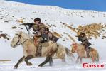March 11,2020 -- Riding on horses, soldiers based in Ali prefecture, Southwest China`s Tibet autonomous region train on March 10, 2020. The training session was carried out in region with an average elevation of 4,600 meters above sea level when the temperature was as low as minus 25 degrees Celsius. (Photo: China News Service/Liu Xiaodong)