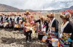 March 17,2020 -- Villagers attend a spring ploughing ceremony in Xierong Village, Quxu County, Lhasa, southwest China`s Tibet Autonomous Region, March 16, 2020. Traditional spring ploughing ceremonies took place in Tibet`s major cultivation areas on Monday to pray for a year with good harvests. (Xinhua/Purbu Zhaxi)