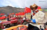 March 17,2020 -- A villager attends a spring ploughing ceremony in Jiaru Village, Gurong Town, Lhasa, southwest China`s Tibet Autonomous Region, March 16, 2020. Traditional spring ploughing ceremonies took place in Tibet`s major cultivation areas on Monday to pray for a year with good harvests. (Xinhua/Chogo)