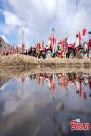 March 18,2020 -- Villagers attend a spring ploughing ceremony in Jiaru Village, Gurong Town, Lhasa, southwest China`s Tibet Autonomous Region, March 16, 2020. Traditional spring ploughing ceremonies took place in Tibet`s major cultivation areas on Monday to pray for a year with good harvests.(Photo: China News Service/ He Penglei)