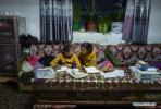 March 30,2020 -- Great-granddaughters of Sonam Drolma have an online lesson in Reguo Village of Gyaca County in Shannan, southwest China`s Tibet Autonomous Region, March 24, 2020. Saturday marks the Serfs` Emancipation Day. Sixty-one years ago, more than one million people, or 90 percent of the region`s population of that time, were liberated from the feudal serfdom. Sonam Drolma is a 109-year-old villager in Reguo Village of Shannan. Since she was born, she has gone through half a century of twists and turns and sufferings as a serf. As a descendant of serfs, Sonam Drolma began to work for serf owners at the age of 15. Sonam served as a serf for 47 years, witnessing her parents and brother die at an early age because of the overwork and poor living conditions. After the democratic reform, she owned the land, houses, cattle and sheep that she had never dreamed of. Since then, she never had to live the life being exploited and oppressed. Then Sonam Drolma gave birth to her daughter. After China`s reform and opening up in early 1980s, Sonam Drolma`s daughter Tsering Dzongpa picked up the baton of the family, going all out to make the family shake off poverty and have a well-off life by hard working. Sonam`s family first contracted 11 mu (about 0.73 hectare) of land and seven walnut trees in the village. Then Tsering Dzongpa started to make a living by woolen weaving. Hard work brings rich returns. The family bought walking tractors, winnowing machines and other machinery one by one, and became the first family in the village to buy a car. Nowadays, Sonam`s family produces more than 5,000 kilograms of grain and 700 kilograms of walnuts annually. If taking the income of woolen weaving into account, the annual income of her family is close to 100,000 yuan (about 14,096 U.S. dollars). The family has expanded their houses for five times. In 2017, they even spent 540,000 yuan (about 76,118 U.S. dollars) to build a new house with an area of 520 square meters. (Xinhua/Jigme Dorje) (Xinhua/Purbu Zhaxi)