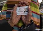 March 30,2020 -- Sonam Drolma holds her identity card in Reguo Village of Gyaca County in Shannan, southwest China`s Tibet Autonomous Region, March 24, 2020. Saturday marks the Serfs` Emancipation Day. Sixty-one years ago, more than one million people, or 90 percent of the region`s population of that time, were liberated from the feudal serfdom. Sonam Drolma is a 109-year-old villager in Reguo Village of Shannan. Since she was born, she has gone through half a century of twists and turns and sufferings as a serf. As a descendant of serfs, Sonam Drolma began to work for serf owners at the age of 15. Sonam served as a serf for 47 years, witnessing her parents and brother die at an early age because of the overwork and poor living conditions. After the democratic reform, she owned the land, houses, cattle and sheep that she had never dreamed of. Since then, she never had to live the life being exploited and oppressed. Then Sonam Drolma gave birth to her daughter. After China`s reform and opening up in early 1980s, Sonam Drolma`s daughter Tsering Dzongpa picked up the baton of the family, going all out to make the family shake off poverty and have a well-off life by hard working. Sonam`s family first contracted 11 mu (about 0.73 hectare) of land and seven walnut trees in the village. Then Tsering Dzongpa started to make a living by woolen weaving. Hard work brings rich returns. The family bought walking tractors, winnowing machines and other machinery one by one, and became the first family in the village to buy a car. Nowadays, Sonam`s family produces more than 5,000 kilograms of grain and 700 kilograms of walnuts annually. If taking the income of woolen weaving into account, the annual income of her family is close to 100,000 yuan (about 14,096 U.S. dollars). The family has expanded their houses for five times. In 2017, they even spent 540,000 yuan (about 76,118 U.S. dollars) to build a new house with an area of 520 square meters. (Xinhua/Jigme Dorje) (Xinhua/Purbu Zhaxi)