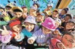 April 3,2020 -- Photo shows children of a kindergarten playing happily in Tunggar Town, Nang County, Nyingchi City, southwest China`s Tibet Autonomous Region. [File photo]