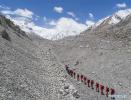 May 8,2020 -- In this aerial photo, climbers and surveyors hike toward a higher spot on their journey to the summit of Mount Qomolangma after setting out from a base camp at the peak in southwest China`s Tibet Autonomous Region on May 6, 2020. A team of over 30 Chinese surveyors left the base camp at Mount Qomolangma for a higher spot on its journey to the peak Wednesday, as part of the country`s mission to remeasure the height of the world`s highest mountain. The team, consisting of professional climbers and surveyors from the Ministry of Natural Resources, will seize the current weather window and attempt for the summit at the optimal time. (Xinhua/Sun Fei)