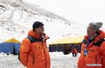 May 8,2020 -- Measurement team members talk at the Mount Qomolangma base camp in southwest China`s Tibet Autonomous Region, May 2, 2020. China has initiated a new round of measurement on the height of Mount Qomolangma, the world`s highest peak. The measurement team arrived at the base camp one month ago, making preparation for the measurement planned in May. As an important starting point and rear base for mountaineering, the Mount Qomolangma base camp is equipped with basic living facilities and medical supplies. (Xinhua/Purbu Zhaxi)