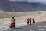 May 8,2020 -- Measurement team members conduct leveling at Tingri County, southwest China`s Tibet Autonomous Region, April 18, 2020. China has initiated a new round of measurement on the height of Mount Qomolangma, the world`s highest peak. A total of 53 members from the Ministry of Natural Resources have conducted preliminary leveling, gravity, global navigation satellite system and astronomical surveys since March 2. (Xinhua/Sun Fei)
