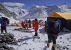 May 9,2020 -- Mountain guides prepare to transport supplies to a camp at the altitude of 7,028 meters, at the advance camp of Mount Qomolangma in southwest China`s Tibet Autonomous Region, May 8, 2020. Chinese surveyors aiming to remeasure the height of Mount Qomolangma rested up and prepared equipment on Friday at the advance camp of an altitude of 6,500 meters, while mountain guides set out to transport supplies to a camp at the altitude of 7,028 meters. Safety ropes to the peak are expected to be set up in the next two days, according to the mountain guides. (Photo by Zhaxi Cering/Xinhua)