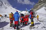 May 9,2020 -- Mountain guides prepare to transport supplies to a camp at the altitude of 7,028 meters, at Mount Qomolangma in southwest China`s Tibet Autonomous Region, May 8, 2020. Chinese surveyors aiming to remeasure the height of Mount Qomolangma rested up and prepared equipment on Friday at the advance camp of an altitude of 6,500 meters, while mountain guides set out to transport supplies to a camp at the altitude of 7,028 meters. Safety ropes to the peak are expected to be set up in the next two days, according to the mountain guides. (Photo by Zhaxi Cering/Xinhua)