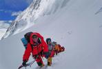 May 9,2020 -- Mountain guides transport supplies including oxygen and fuel to a camp at the altitude of 7,028 meters, at Mount Qomolangma in southwest China`s Tibet Autonomous Region, May 8, 2020. Chinese surveyors aiming to remeasure the height of Mount Qomolangma rested up and prepared equipment on Friday at the advance camp of an altitude of 6,500 meters, while mountain guides set out to transport supplies to a camp at the altitude of 7,028 meters. Safety ropes to the peak are expected to be set up in the next two days, according to the mountain guides. (Photo by Lhagba/Xinhua)