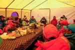 May 19,2020 -- Team members gather for the announcement of a list who will climb to the peak of Mount Qomolangma at the advance camp at an altitude of 6,500 meters on Mount Qomolangma, May 18, 2020. A Chinese mountaineering team on Monday released a list of 12 people, including two surveyors, who will climb to the peak of Mount Qomolangma. If everything goes smoothly, they will arrive at the peak on May 22 to conduct surveys in gravity, global navigation satellite systems, weather and depths of ice and snow. Chen Gang and Wang Wei, both of whom are surveyors from the Ministry of Natural Resources, are on the list. If either of them manages to arrive at the peak, it will set a record for Chinese surveyors setting foot on the world`s highest mountain peak, according to the team. The names of a support squad and a backup squad were also released on Monday. (Xinhua/Tashi Tsering)