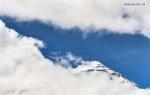 May 20,2020 -- Mount Qomolangma is seen behind clouds on April 30, 2020. (Xinhua/Jigme Dorje)