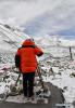 May 28,2020 -- Chinese surveyor Zheng Lin conducts surveying at Mount Qomolangma base camp in southwest China`s Tibet Autonomous Region on May 27, 2020. A Chinese survey team reached the summit of Mount Qomolangma Wednesday, and remeasured the height of the world`s highest peak. After summiting at 11 a.m., the eight-member team erected a survey marker and installed a GNSS antenna on the snow-covered peak, which measures less than 20 square meters, while other surveyors conducted observations from six points beneath the peak. (Xinhua/Purbu Zhaxi)