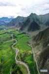 July 15,2020 -- Aerial photo taken on July 14, 2020 shows the countryside scenery in Jangraxar Township of Lhunzhub County, Lhasa, southwest China`s Tibet Autonomous Region. (Xinhua/Zhan Yan)