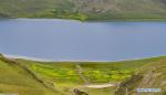 July 31,2020 -- Photo taken on July 29, 2020 shows a view of the Yamzho Yumco lake in Shannan, southwest China`s Tibet Autonomous Region. (Xinhua/Zhang Rufeng)