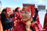 Aug.3,2020 -- Local residents get dressed up before a Guge Xuan Dance performance in Zanda County of Ali Prefecture, southwest China`s Tibet Autonomous Region, July 27, 2020. The dance is a Tibetan cultural heritage from the ancient Guge Kingdom that mixes speech, singing and dancing. (Xinhua/Zhan Yan)