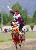 Aug.4,2020 -- Farmers dressed in festive costumes take part in a horse race to celebrate the Wangguo Festival at Sangda village in Lhasa, Southwest China`s Tibet autonomous region, on Aug 2, 2020. The Wangguo Festival, which has a history of more than 1,500 years, is a traditional festival of Tibetan people to greet the forthcoming harvest. [Photo by Daqiong/chinadaily.com.cn]
