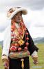 Aug.10,2020 -- A woman takes part in a Tibetan fashion show on Zhaqingtang grassland in Sertar County, southwest China`s Sichuan Province, Aug. 7, 2020. (Xinhua/Jiang Hongjing)