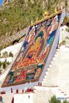 Aug.20,2020 -- Photo taken on Aug. 19, 2020 shows a huge Thangka painting displayed during a traditional `sunning of the Buddha` ceremony at the Drepung Monastery in Lhasa, southwest China`s Tibet Autonomous Region. Celebrations for the traditional Shoton Festival, or Yogurt Festival, began in Lhasa on Wednesday. (Xinhua/Zhan Yan)